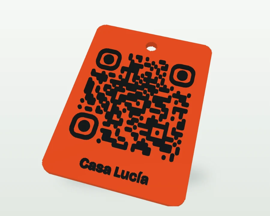 Llavero impreso en 3D con código QR en relieve y agujero para la anilla